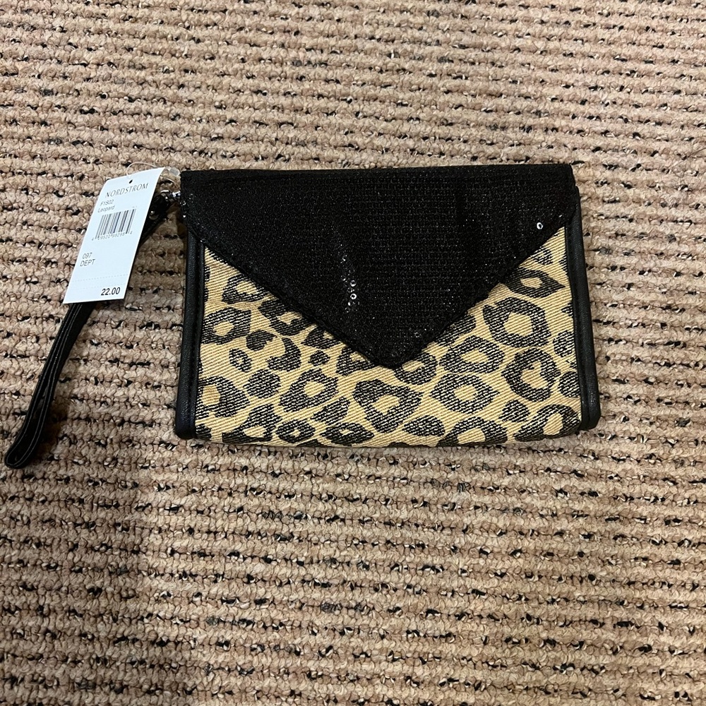 Leopard and sequin wristlet